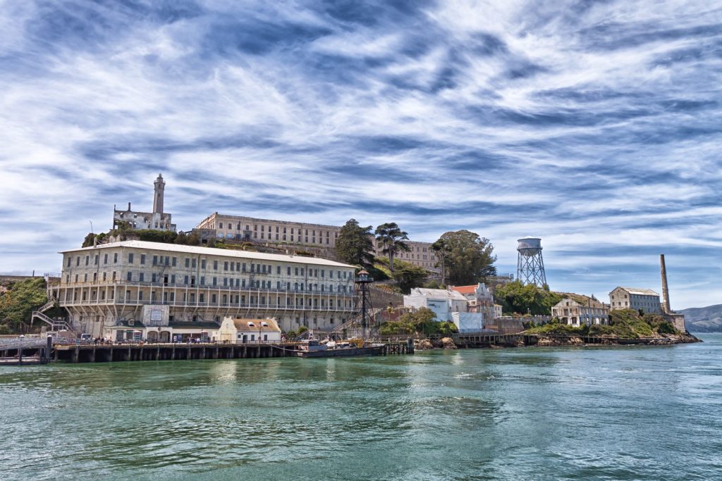 View of Alcatraz Island from the ferry crossing San Francisco Bay